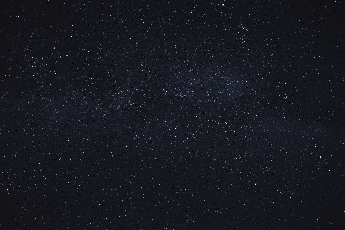 Galaxy star projector creating stunning night sky in bedroom - AuraHome